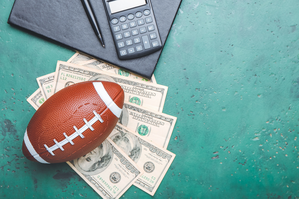 Money and Rugby Ball on Color Background. Concept of Sports Bet